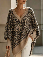 Cozy, Chic Knit Top With A Buttoned Stand Collar And Contrasting Stripes.
