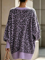 Cozy, Chic Knit Top With A Buttoned Stand Collar And Contrasting Stripes.